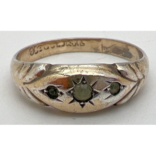 1068 - A antique 9ct gold on silver gypsy style ring set with 3 clear stones. Gold marks to inside of band.... 