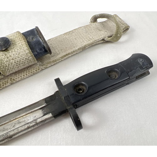 1180 - A vintage post WWII L.1.A.4 9600259 Bayonet with scabbard and canvas carry strap. S.M. also stamped ... 