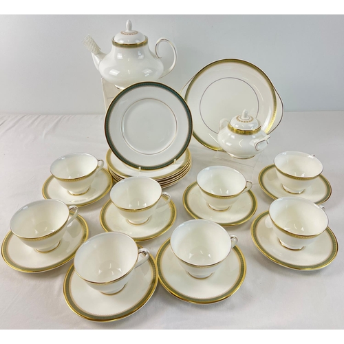 1216 - A quantity of Royal Doulton Georgian shape tea ware in classic 'Clarendon' pattern, with gilt detail... 