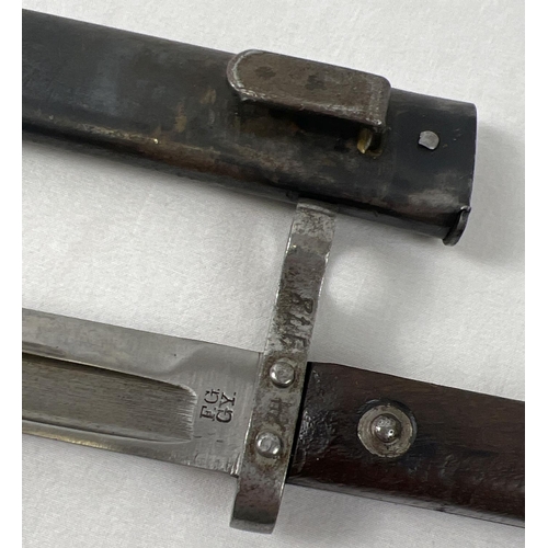 1182 - Austro-Hungarian Maulicher  F.G.G.Y. rifle bayonet with wooden grips and scabbard. Engraved 