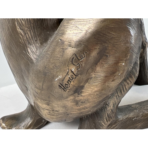 1311 - A large bronze effect resin figure of 