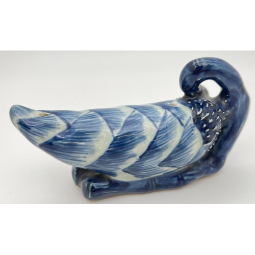 1267 - A Chinese ceramic blue and white hand painted brush rest in the form of a Chinese bitter melon. Appr... 