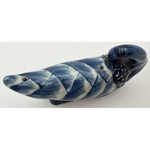 1267 - A Chinese ceramic blue and white hand painted brush rest in the form of a Chinese bitter melon. Appr... 