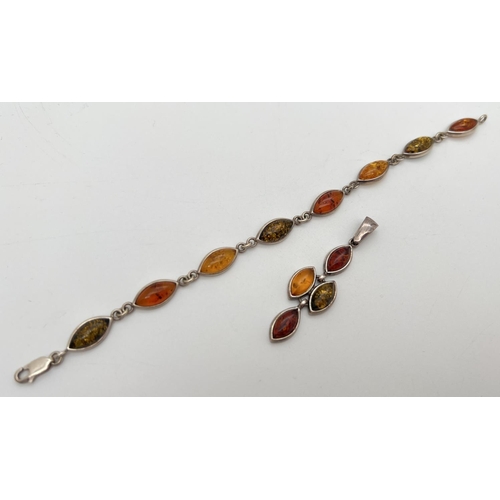 1007 - A silver bracelet and matching drop pendant set with green, honey and cognac marquise cut amber piec... 