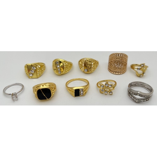 1079 - 10 assorted men's & women's costume jewellery gold and silver tone rings. To include stone set and e... 