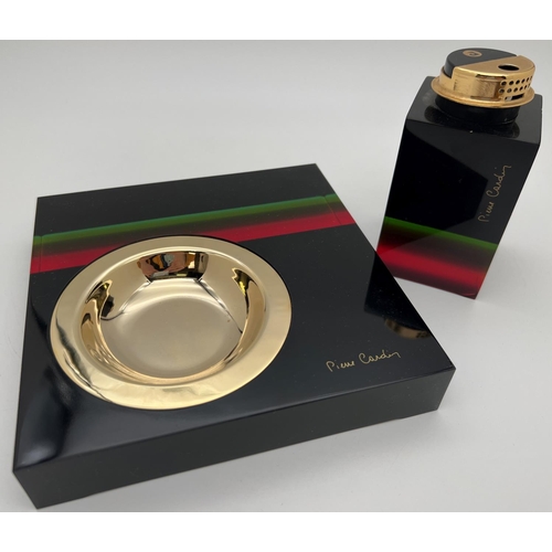 1317 - A 1970's black and rainbow stripe Lucite smoking set by Pierre Cardin. Block lighter with gold tone ... 