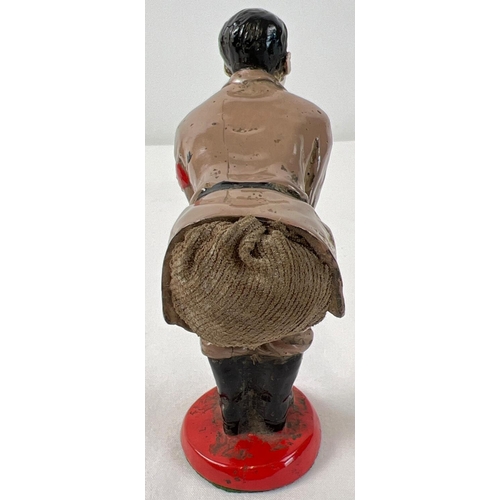 1186 - A novelty painted cast metal pin cushion in the form of Adolf Hitler. Approx. 11.5cm tall.