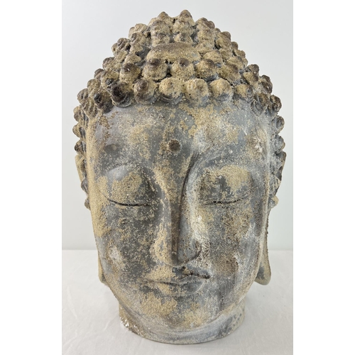 1404 - A large weathered concrete effect resin ornamental Buddha head. Approx. 45cm tall.