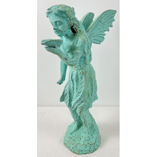 1405 - A vintage cast iron garden ornament modelled as a fairy drinking from a shell, painted green. Approx... 