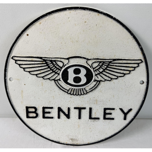 1294 - A Bentley circular shaped cast iron wall plaque, painted black & white. With fixing holes. Approx. 2... 