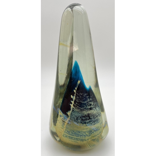 1250 - A large Mdina glass obelisk paperweight in blue gold and clear colours. Approx. 18cm tall.