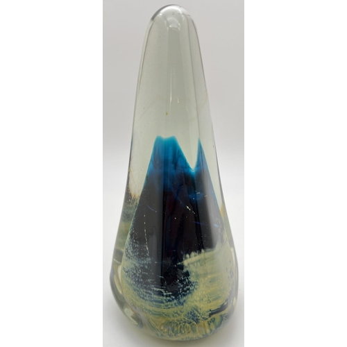 1250 - A large Mdina glass obelisk paperweight in blue gold and clear colours. Approx. 18cm tall.