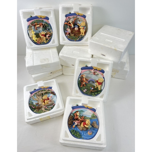 1326 - A collection of 12 limited edition Winnie The Pooh 3D design, resin wall plaques/plates. In varying ... 