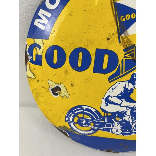 1147 - A circular shaped convex enamelled wall sign for Goodyear motorcycle tyres. Approx. 29.5cm diameter.