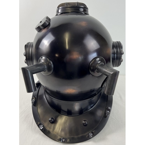 1331 - A full sized replica brown coloured metal mark V US Navy divers helmet. With glass panels and hinged... 