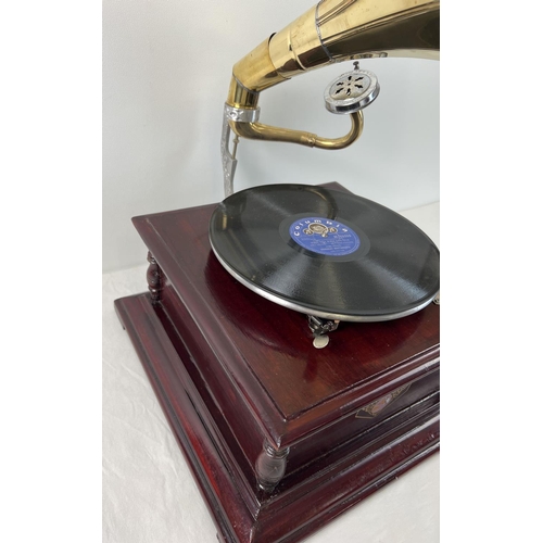 1332 - A reproduction wooden cased table top, wind up, trumpet gramophone marked 