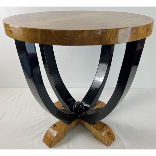 1428 - An Art Deco design circular shaped walnut veneer occasional table. With natural wood finish to top a... 