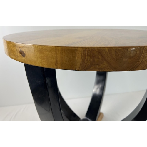 1428 - An Art Deco design circular shaped walnut veneer occasional table. With natural wood finish to top a... 