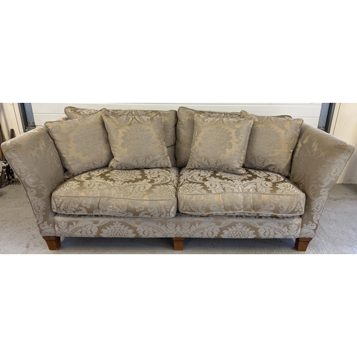 1431 - A modern 3 seater sofa and matching footstool in coffee coloured damask fabric with feather filled c... 