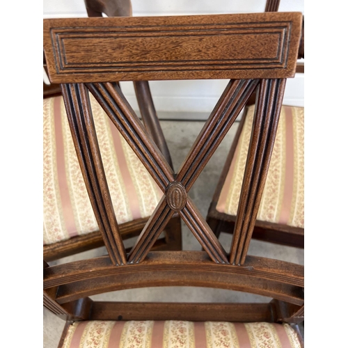 1437 - 3 mahogany Regency style dining chairs together with a Victorian slat backed carved arm chair. With ... 