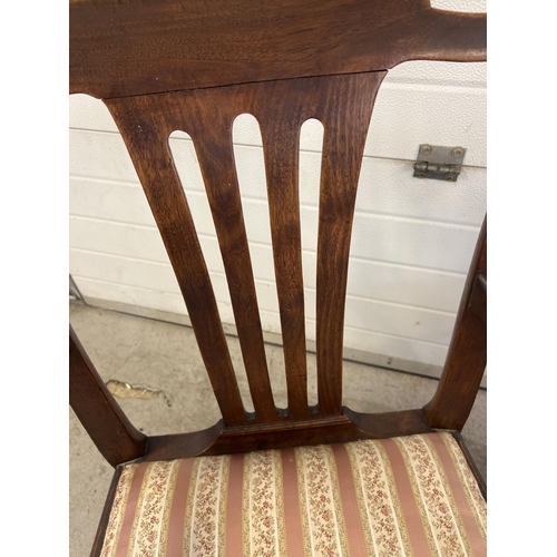 1437 - 3 mahogany Regency style dining chairs together with a Victorian slat backed carved arm chair. With ... 