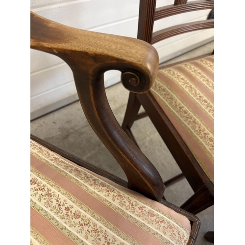 1437 - 3 mahogany Regency style dining chairs together with a Victorian slat backed carved arm chair. With ... 