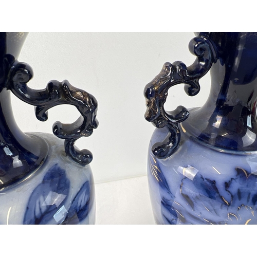 1228 - 2 blue and white glazed urn style vases by Stafford pottery maker Thomas Forester & Sons Ltd. Floral... 