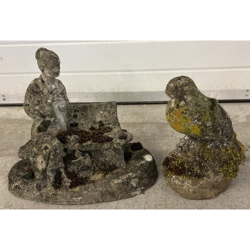 1411 - 2 vintage concrete garden ornaments. A woman seated on a bench (approx. 33cm tall x 41cm long) toget... 