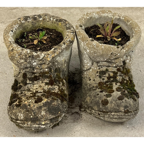 1417 - A pair of large vintage concrete garden planters modelled as boots. Each approx. 23cm tall x 44cm lo... 