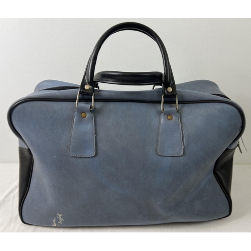 1365 - A vintage blue and black classic design Adidas holdall. Adidas name to front with 2 carry handles an... 