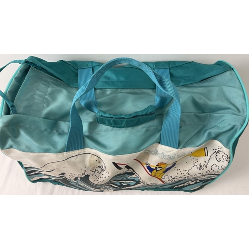 1366 - A vintage Adidas 'Canoe Island Crew' nylon holdall. Turquoise and teal colours with canoe and wave d... 