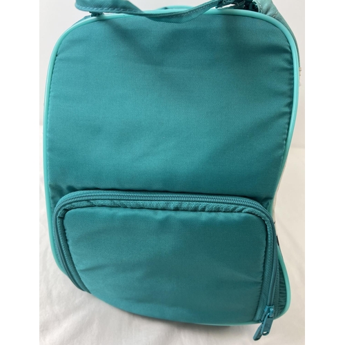 1366 - A vintage Adidas 'Canoe Island Crew' nylon holdall. Turquoise and teal colours with canoe and wave d... 