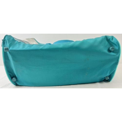 1366 - A vintage Adidas 'Canoe Island Crew' nylon holdall. Turquoise and teal colours with canoe and wave d... 