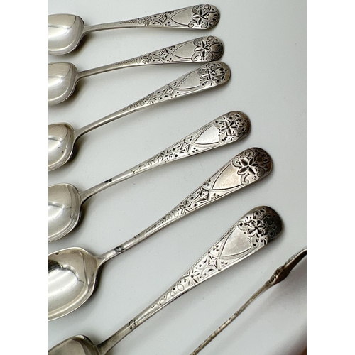 1118 - A small pair of decorative sterling silver sugar nips with floral decoration. Together with a set of... 