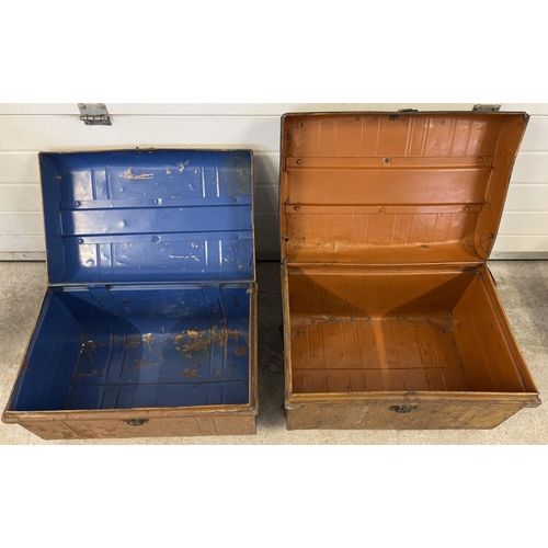 1152 - 2 vintage tin trunks. Both with carry handles and stud detail to top. Front catch to both a/f. Large... 