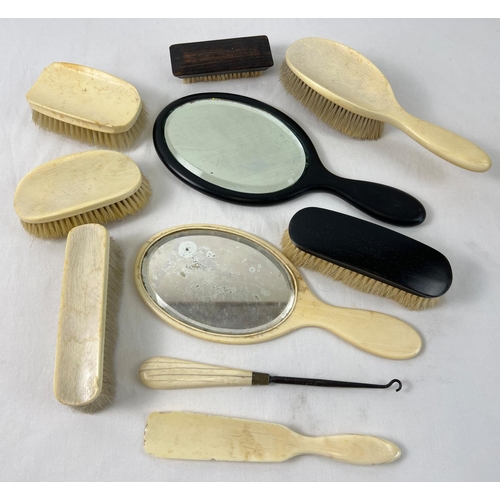 1347 - A collection of vintage ebony and bone handled dressing table mirrors, brushes & vanity items.