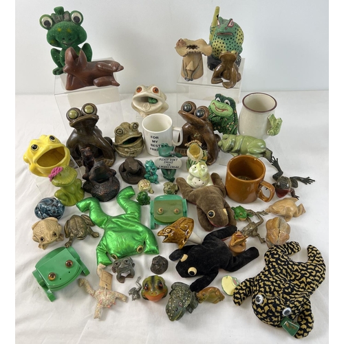 1349 - A large collection of frog figures, ornaments, mugs and beanbags. To include studio pottery, wooden,... 