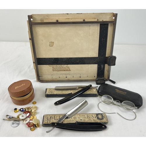 1355 - A collection of assorted vintage items to include 2 boxed cut-throat razors. Lot also includes leath... 