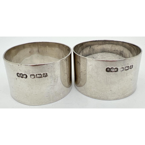 1124 - A pair of R F Mosley & Co vintage silver napkin rings, fully hallmarked for Sheffield, 1942. Engrave... 