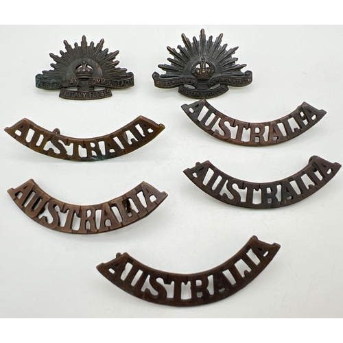 1194 - A collection of WWI Australian Commonwealth Military Forces badges. To include lug backed cap badge,... 