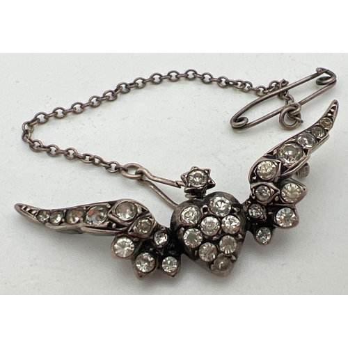 1002 - A vintage 900 silver sweetheart stone set pin back brooch with safety chain. Pin is missing from rev... 