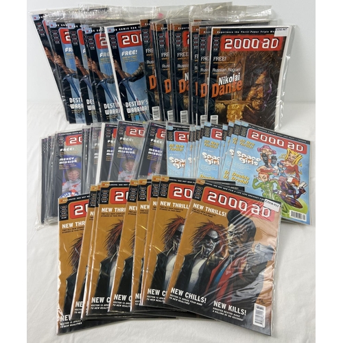 1353 - 56 bulk issues of 2000 AD Comic Books by Fleetway Comics. 8 copies of Issue #1034 (7 sealed, 1 in ba... 