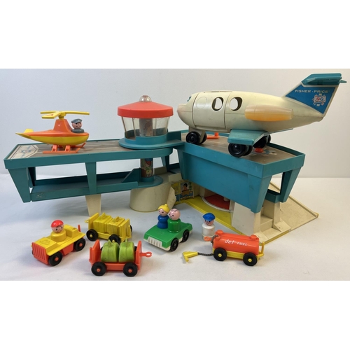 1361 - A vintage Fisher Price Airport. With passenger plane, helicopter, luggage carts, cars, figures and j... 