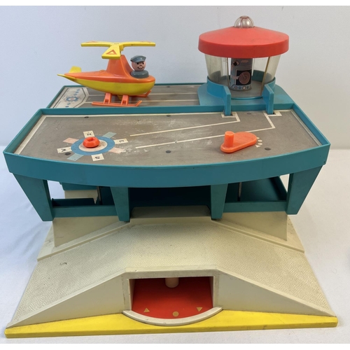 1361 - A vintage Fisher Price Airport. With passenger plane, helicopter, luggage carts, cars, figures and j... 