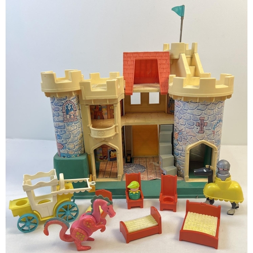 1362 - A vintage Fisher Price Castle play set with figures and accessories to include a horse with knight a... 