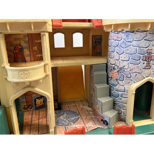 1362 - A vintage Fisher Price Castle play set with figures and accessories to include a horse with knight a... 