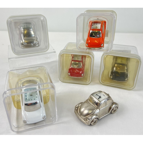 1446 - 5 boxed and 1 unboxed miniature metal novelty quartz desk clocks modelled as Volkswagen Beetle cars.... 