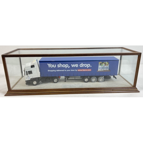 1369 - A 1:43 scale diecast Tibbett & Britten Tesco lorry by Eligor in a bespoke made glass display case. C... 