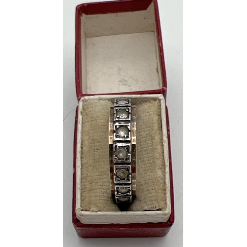 1011 - A vintage silver and 9ct gold white topaz set full eternity ring, in a vintage ring box. Inside of b... 