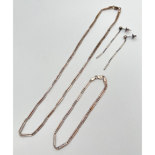 1022 - A silver bar and ball design necklace, with matching bracelet and drop earrings. Lobster claw clasps... 